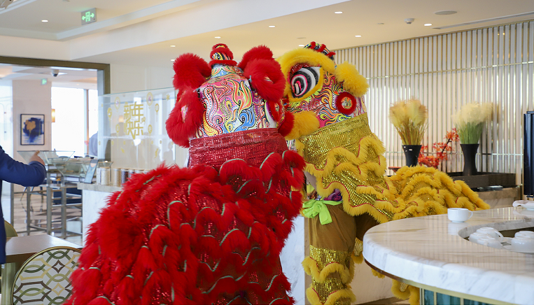 wfc:舞狮纳福闹新春 欢天喜地开门红 新闻中心 重庆华迅实业集团有限